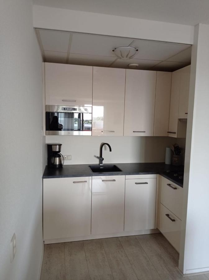 Appartement Ijsselmeer Makkum Strand Buitenkant foto